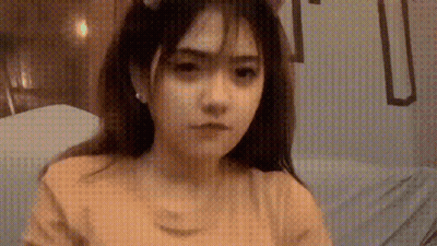 Girl In Cat Ear Headband And Yellow Shirt GIF