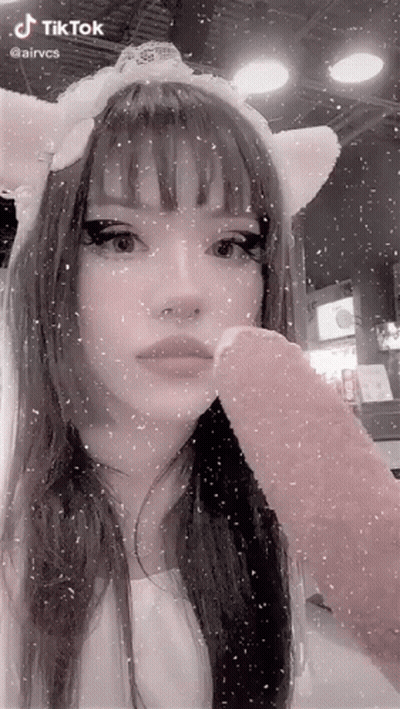 Girl In Cat Ears Headband Holding Pink Ice Cream GIF