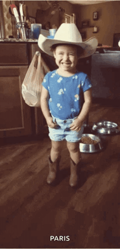 Girl In Cowboy Hat And Shorts GIF