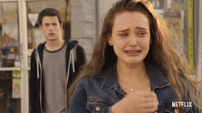 Girl In Denim Jacket Crying With Boy Behind GIF