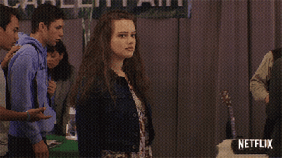 Girl In Denim Jacket With Netflix Sign GIF