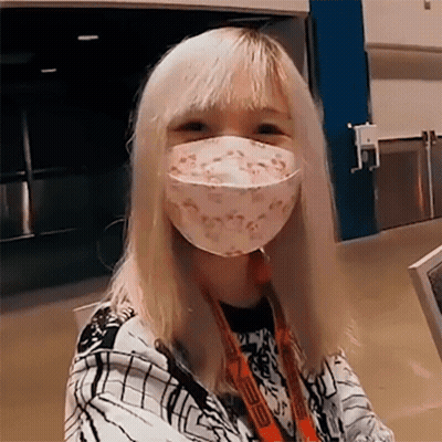 Girl In Face Mask And Lanyard GIF