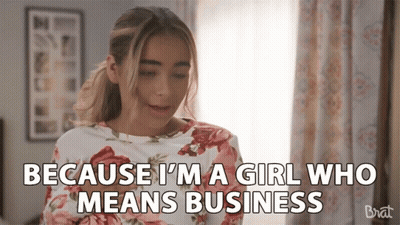 Girl In Floral Shirt Says Because I'm A Girl Who Means Business GIF