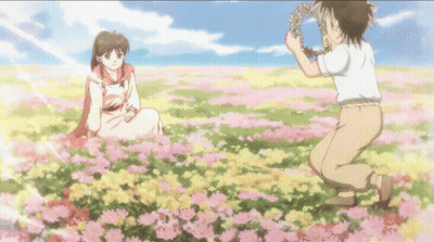 Girl In Flower Field Boy Holding Wreath GIF