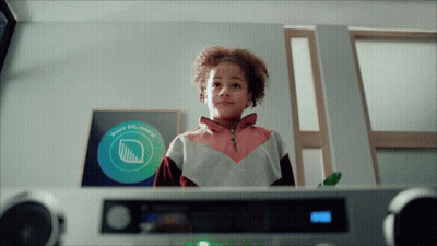 Girl In Front Of Beach City Sign GIF