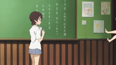 Girl In Front Of Chalkboard With Chinese Writing GIF