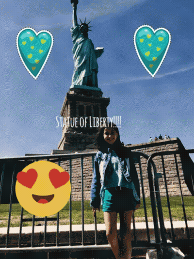 Girl In Front Of Statue Of Liberty GIF