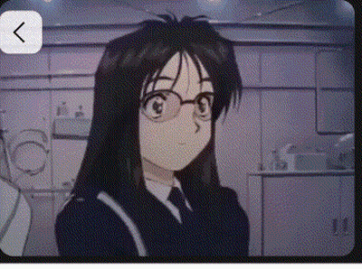 Girl In Glasses And Suit Looking At Camera GIF