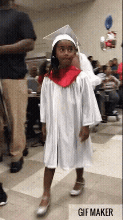 Girl In Graduation Cap And Gown GIF