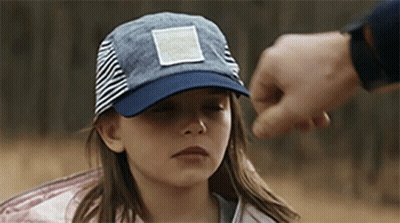 Girl In Hat Held By Man's Hand GIF