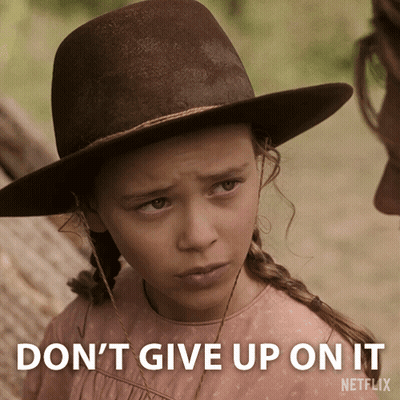 Girl In Hat Saying Don't Give Up On It GIF