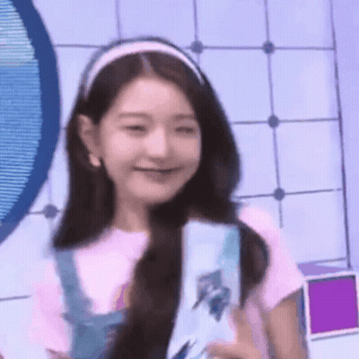 Girl In Headband And Overalls Smiling GIF