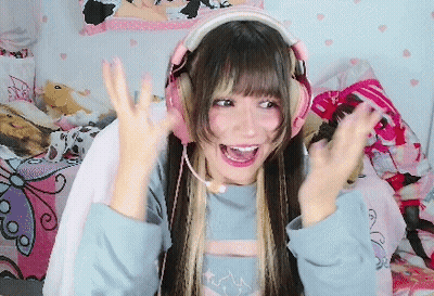 Girl In Headphones And Microphone Making A Face GIF