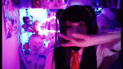 Girl In Headset And Tie Making Peace Sign GIF