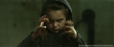 Girl In Hooded Jacket Hands On Face GIF