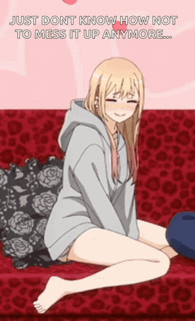 Girl In Hoodie Sitting On Couch With Leopard Pillow GIF