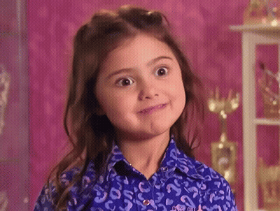 Girl In Leopard Print Shirt Making Face GIF