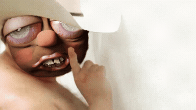 Girl In Levi's Shirt Holding Scissors In Store GIF