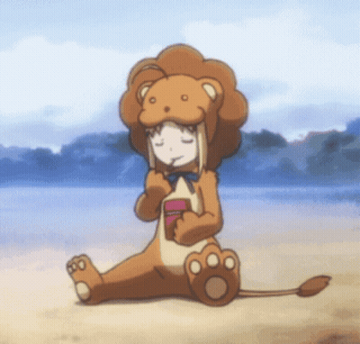 Girl In Lion Costume On Beach GIF