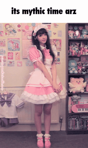 Girl In Maid Costume Standing Before Stuffed Animals Shelf GIF