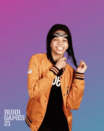 Girl In Orange Jacket Ruhr Games 21 GIF