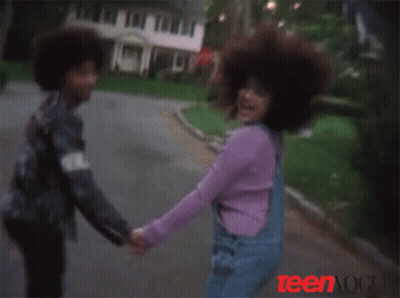 Girl In Overalls Holding Man's Hand Teen Ad GIF