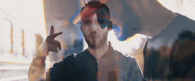 Girl In Overalls With Letter E On Shirt GIF
