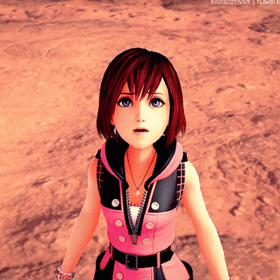 Girl In Pink And Black Outfit Standing In Desert GIF