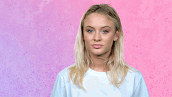 Girl In Pink Background Blank Stare GIF