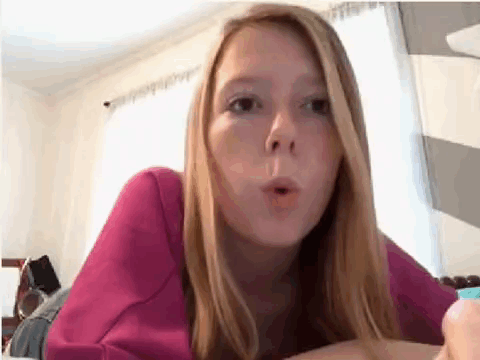 Girl In Pink Blowing Bubble GIF