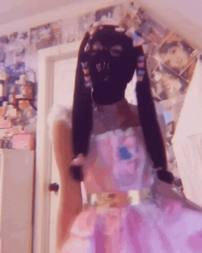 Girl In Pink Dress And Ski Mask GIF