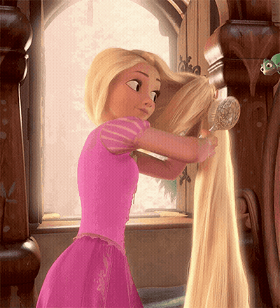 Girl In Pink Dress Brushing Hair GIF