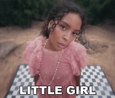 Girl In Pink Dress On Checkered Rug Little Girl GIF