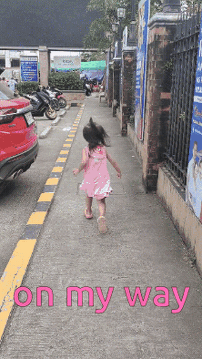 Girl In Pink Dress Walking GIF