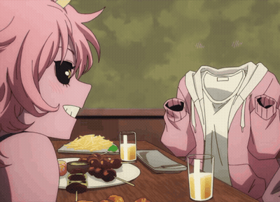 Girl In Pink Hoodie Sitting At Table With Food GIF