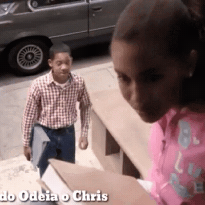 Girl In Pink Shirt Looking At Boy In Plaid Shirt Do Odeia O Chris GIF