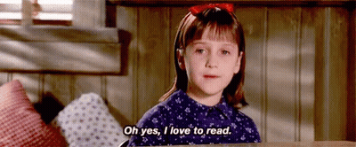 Girl In Purple Dress Reading GIF