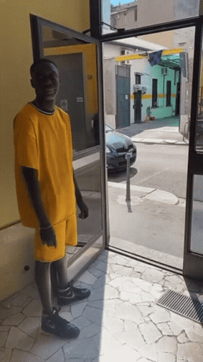 Girl In Purple Dress With Red Rays From Arms GIF