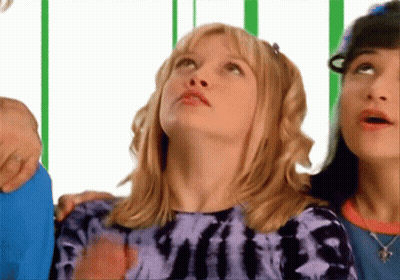 Girl In Purple Tie Dye Shirt Looking Up GIF