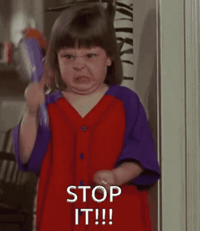 Girl In Red And Purple Dress Saying Stop GIF