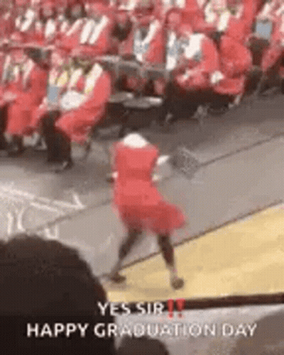 Girl In Red Dress Dancing At Graduation GIF
