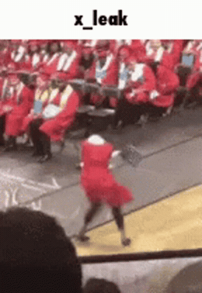 Girl In Red Dress Dancing At Graduation GIF