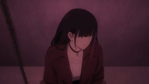 Girl In Red Jacket Sitting In Dark Room GIF