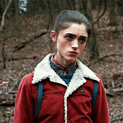 Girl In Red Jacket With Sherpa Collar And Plaid Shirt GIF