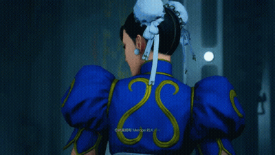 Girl In Red Shirt Looking At Man In Blue Shirt GIF