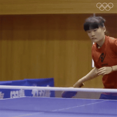 Girl In Red Shirt Playing Ping Pong GIF