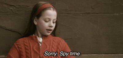 Girl In Red Sweater Sitting On Bench Saying Sorry Spy Time GIF