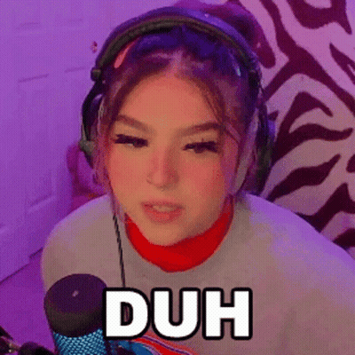 Girl In Red Turtleneck And Headphones Saying Duh GIF