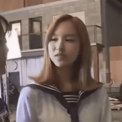 Girl in Sailor Suit Next to Man