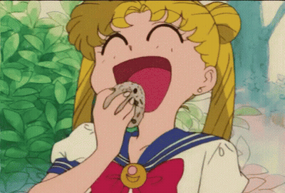 Girl In Sailor Uniform Eating GIF